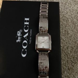 A silver coach women wacth